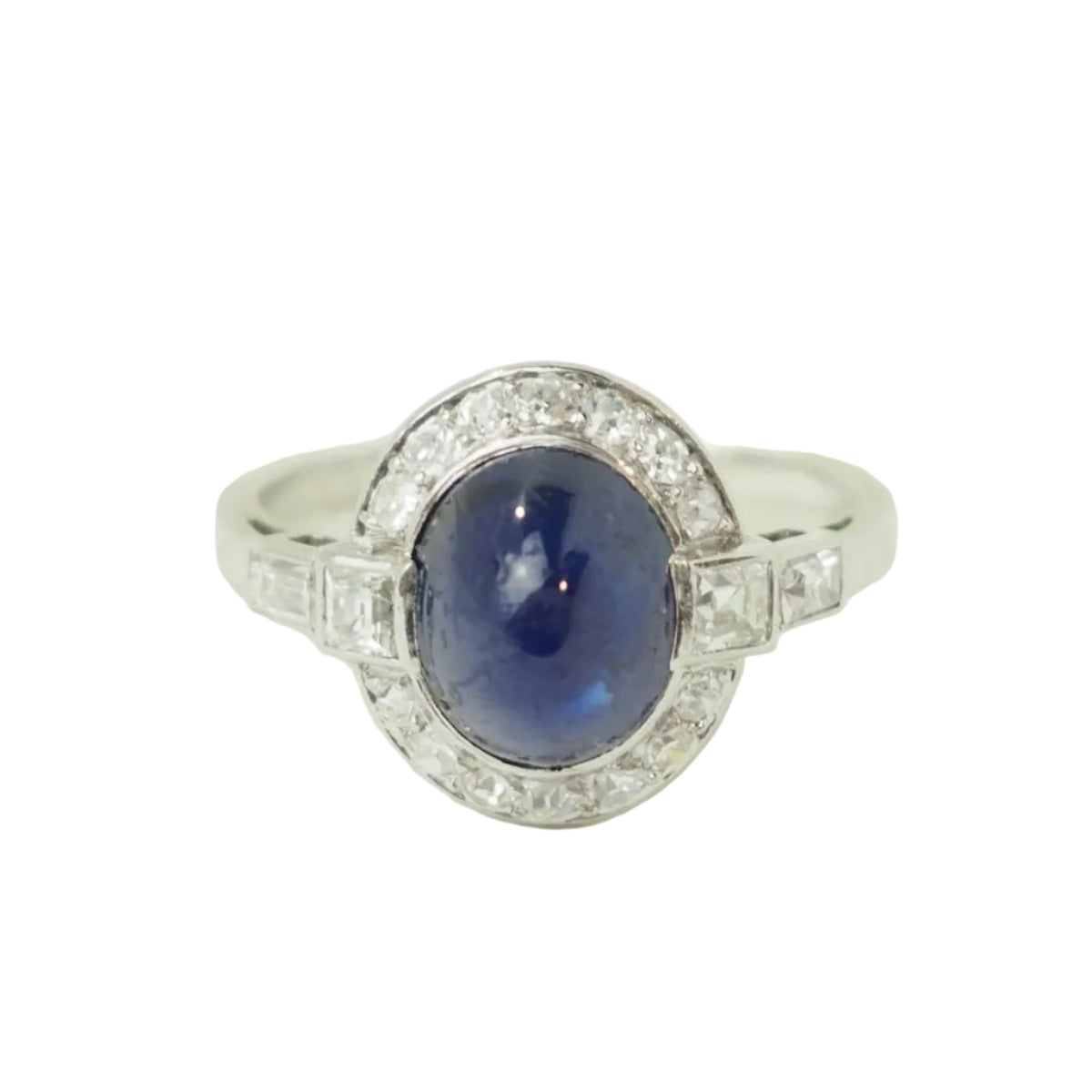 Bague Entourage en platine, saphir, et diamants