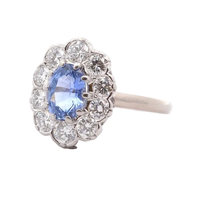 Bague Marguerite en or blanc, platine, saphir et diamants