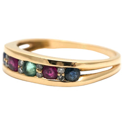 Bague Bandeau en or jaune, émeraude, rubis, saphirs et diamants