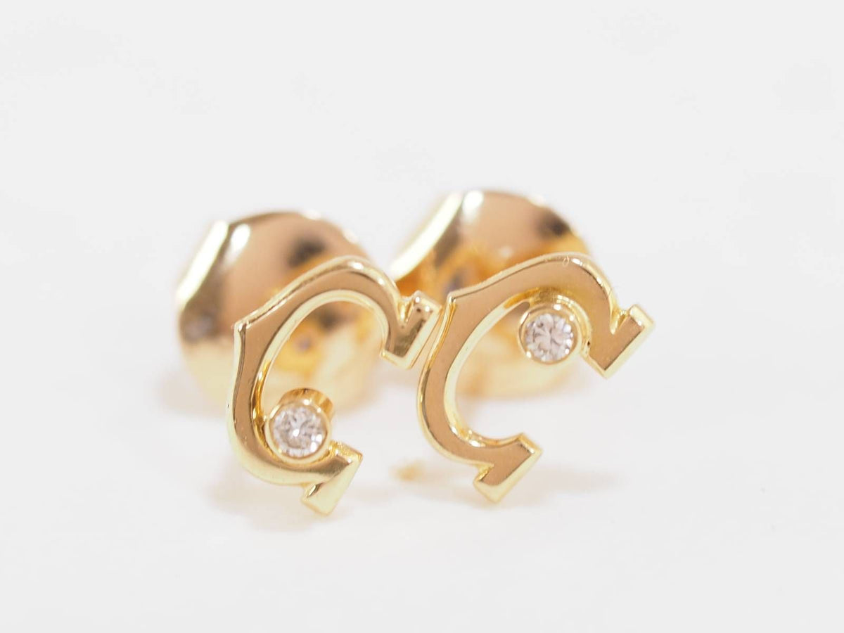Boucles d'oreilles Puces CARTIER "C" en or jaune et diamants