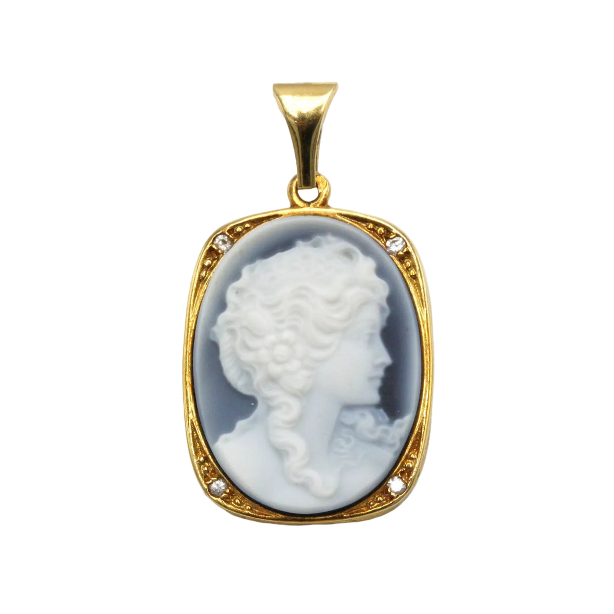 Pendentif en or jaune, onyx et diamants