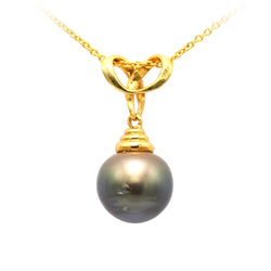Pendentif en or jaune et perle