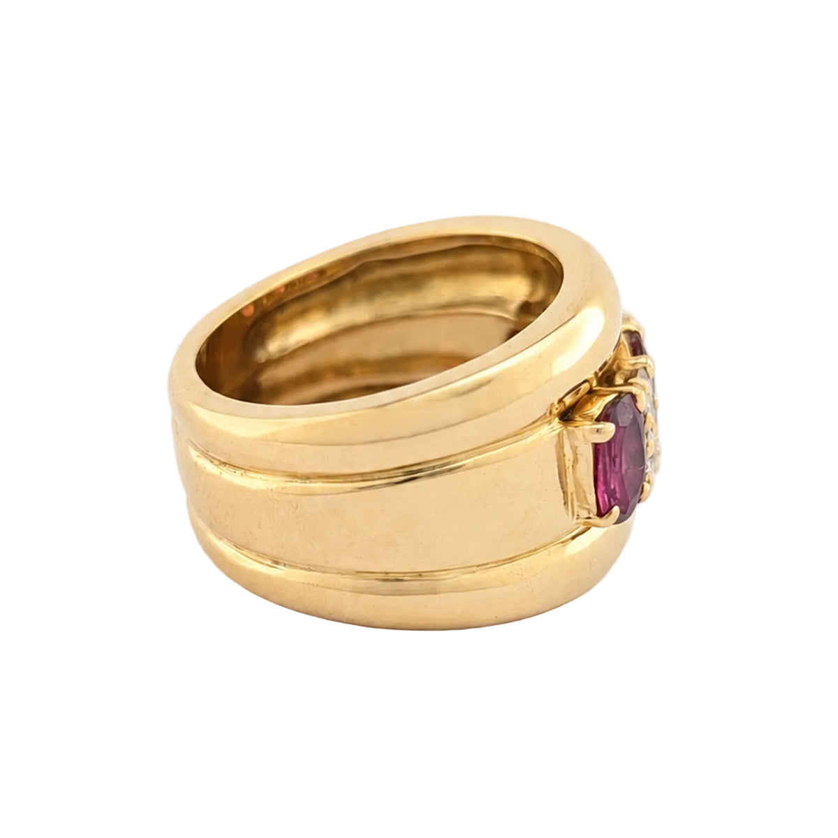 Bague Bandeau en or jaune, rubis et diamants