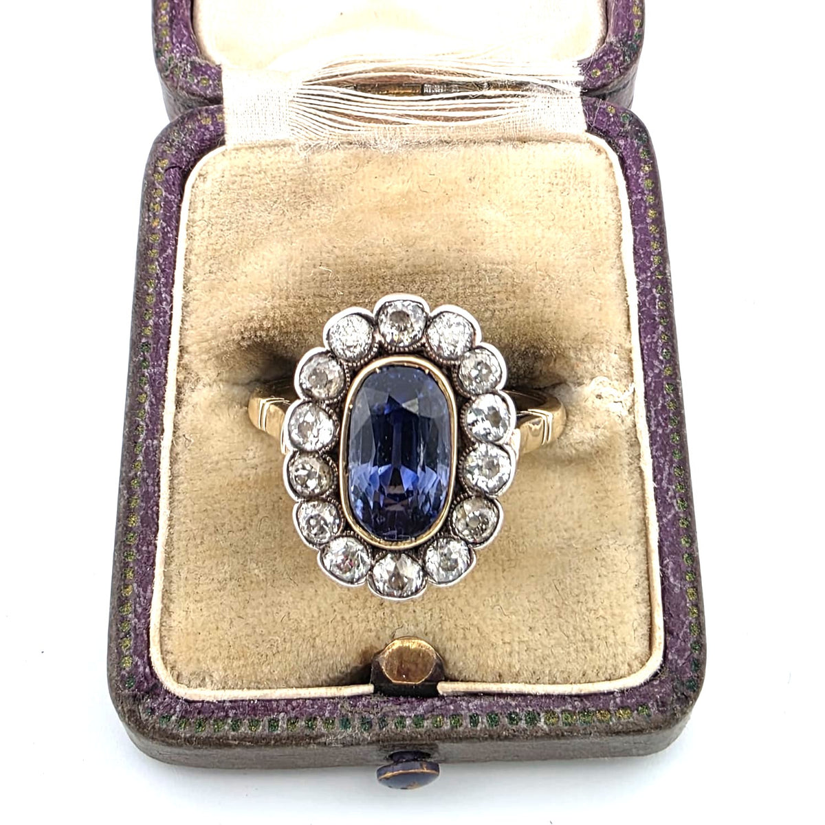 Bague Entourage en or jaune, argent, saphir et diamants
