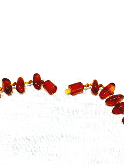 Collier En Perle d'Ambreflag