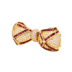 Broche Clip en or jaune, rubis et diamants
