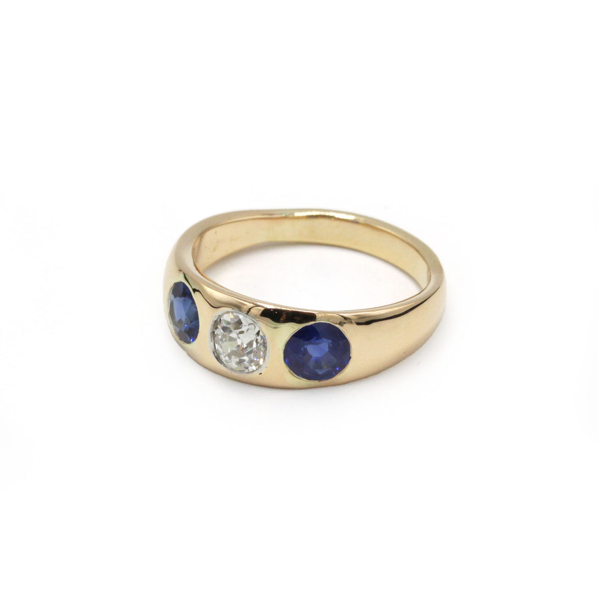 Bague Jonc en or jaune, saphirs et diamant