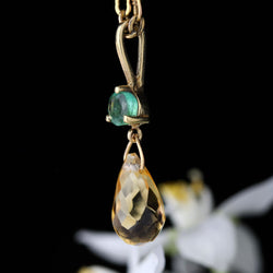 Pendentif en or jaune, émeraude et citrine