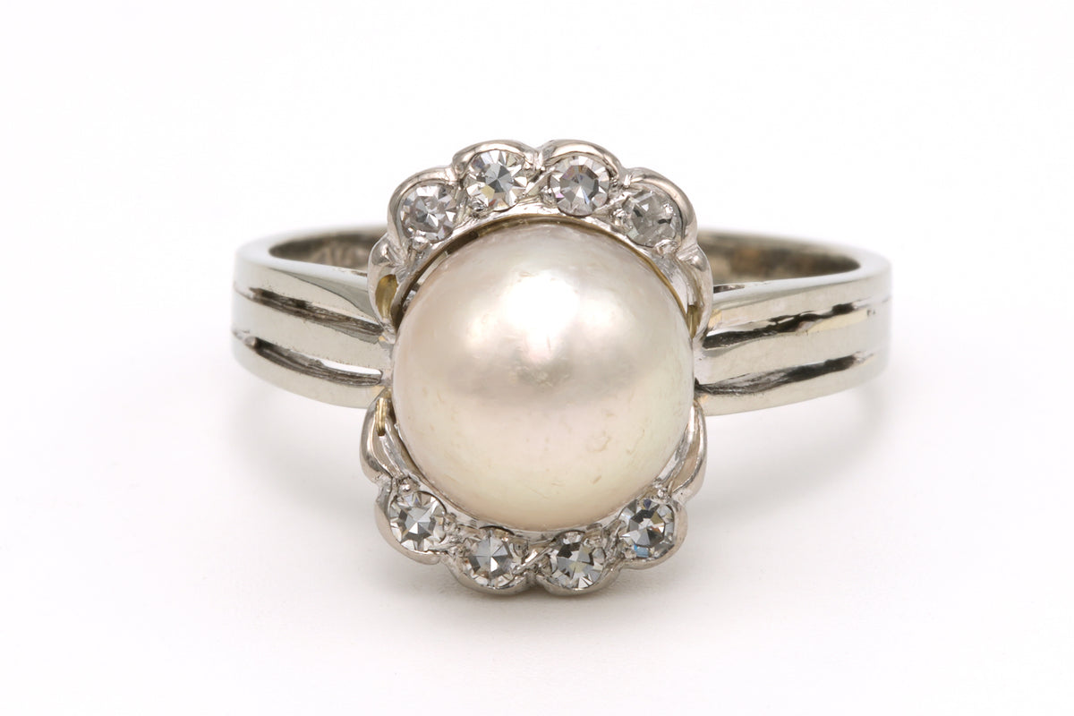 Bague Entourage en or blanc, perle et diamants