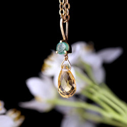 Pendentif en or jaune, émeraude et citrine