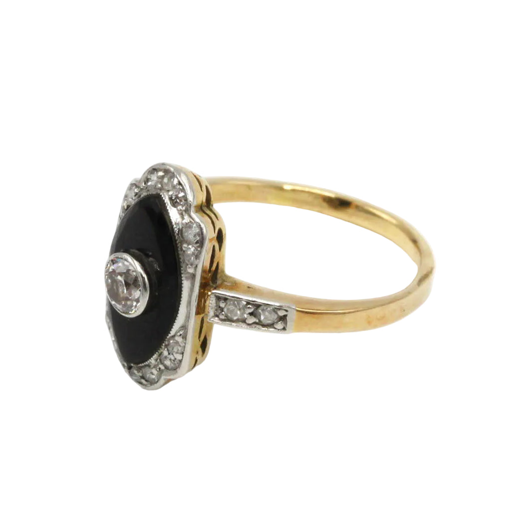 Bague en or jaune, platine, onyx et diamants