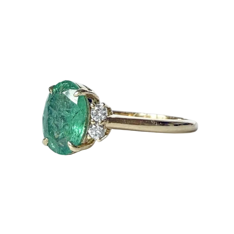 Bague Solitaire en or jaune, émeraude et diamants
