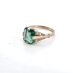 Bague Solitaire en or blanc, émeraude et diamants