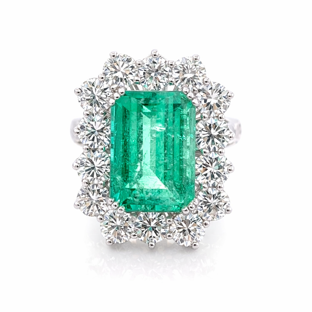 Bague Entourage en or blanc, émeraude et diamants