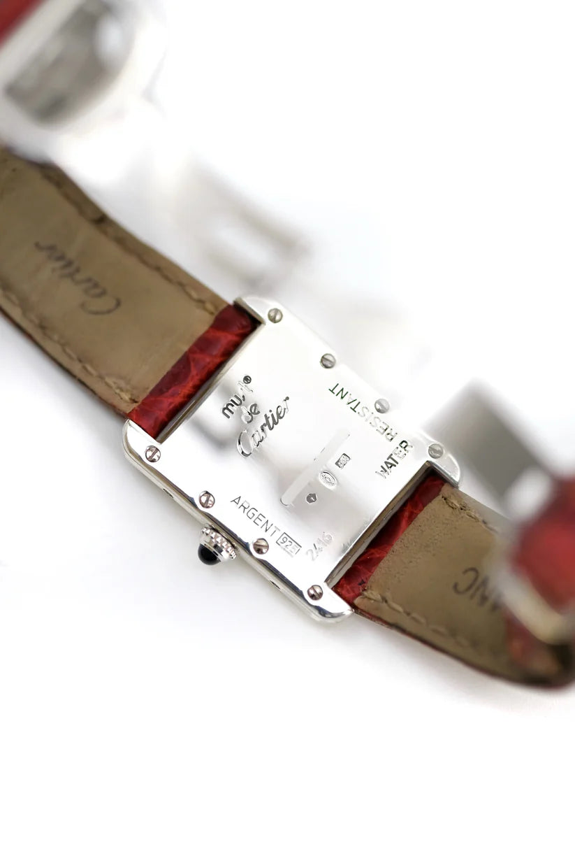 Montre CARTIER Tank en argent et cuir