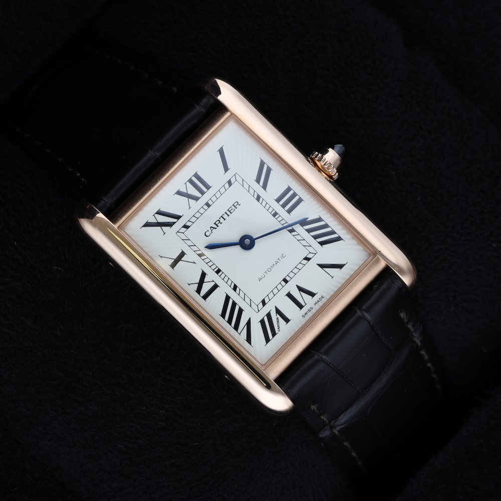 Montre CARTIER "Tank Louis Cartier" GM en or rose et cuir