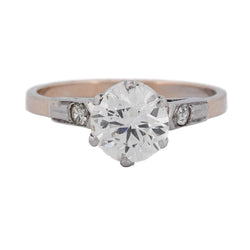 Bague Solitaire en or rose, platine et diamants