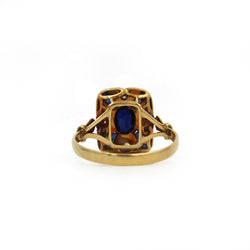 Bague Entourage en or jaune, platine, saphirs et diamants