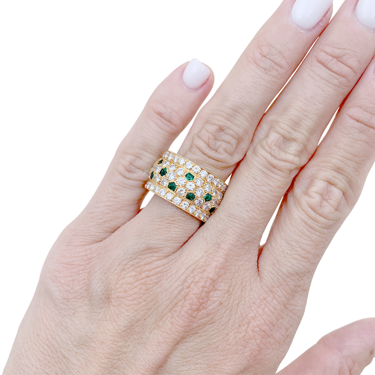 Bague Bandeau CARTIER "Nigéria" en or jaune, émeraudes et diamants