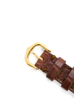 Montre CARTIER "Tank" en or jaune et cuir