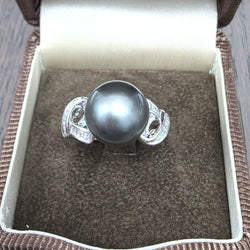 Bague Solitaire en or blanc, perle et diamants