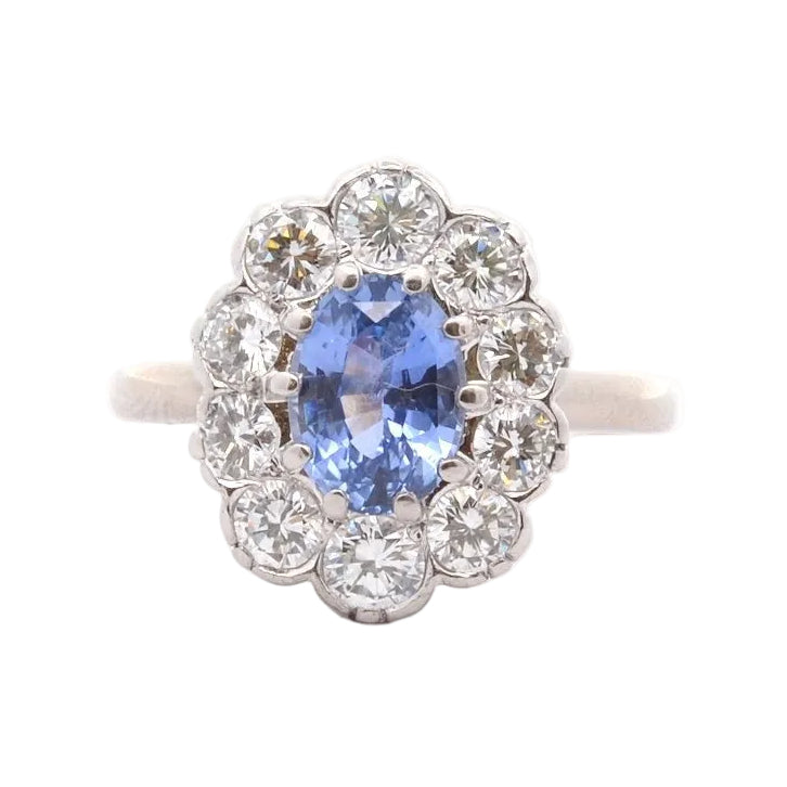 Bague Marguerite en or blanc, platine, saphir et diamants