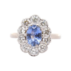 Bague Marguerite en or blanc, platine, saphir et diamants