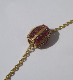 Pendentif en or jaune et rubis