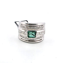 Bague en or jaune, émeraude diamants
