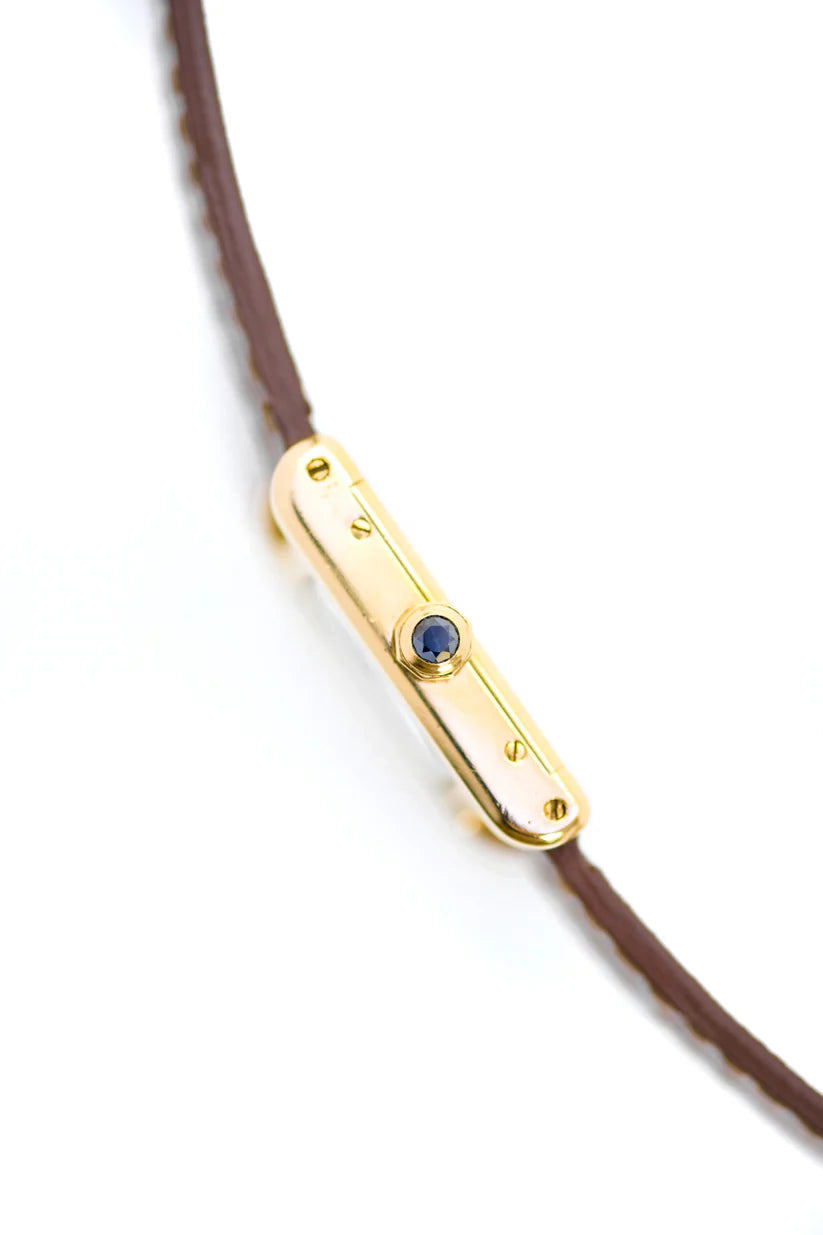 Montre CARTIER "Tank" en or jaune et cuir