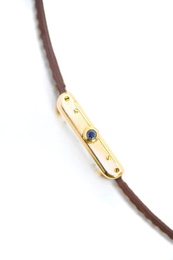 Montre CARTIER "Tank" en or jaune et cuir