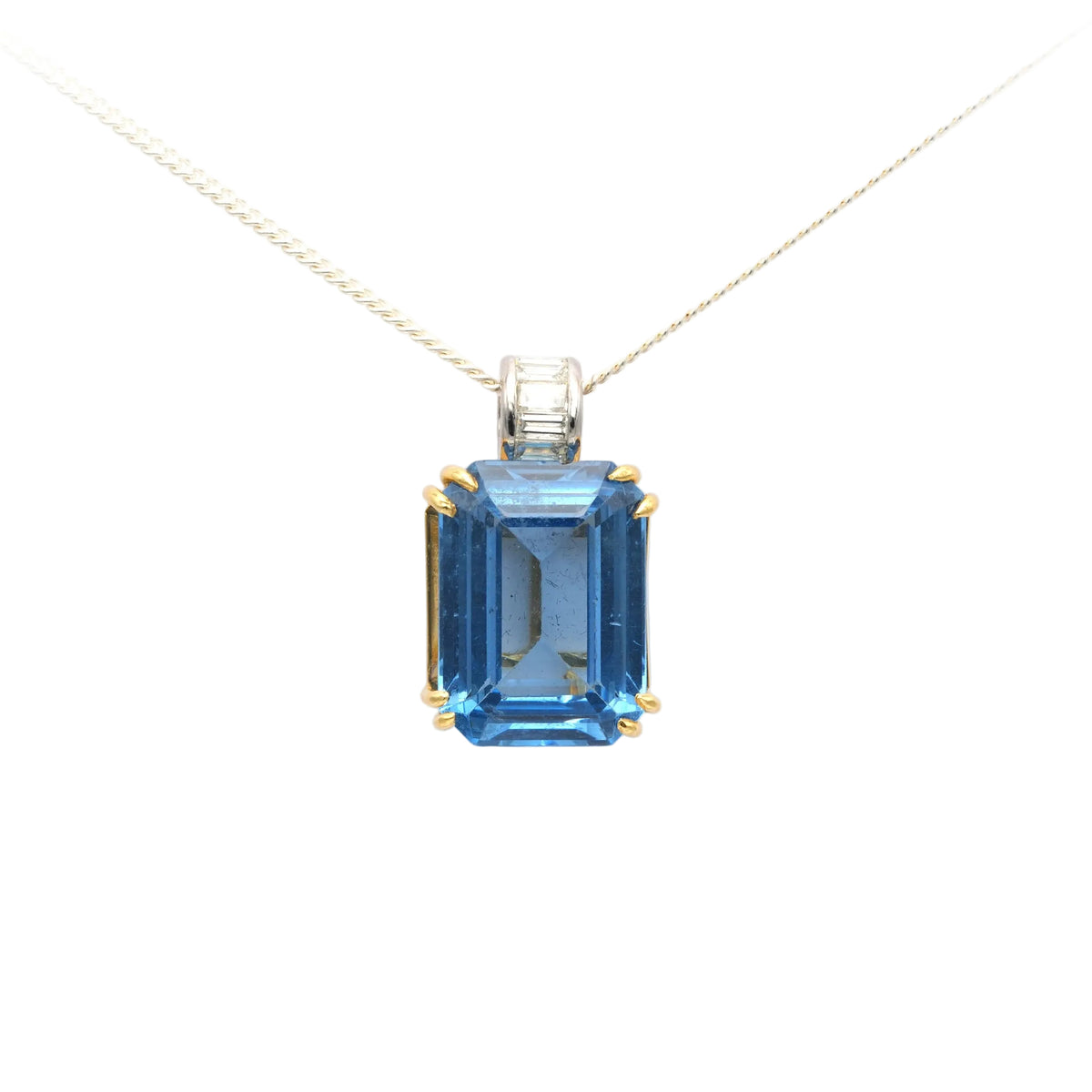 Pendentif en or jaune, topaze et diamants