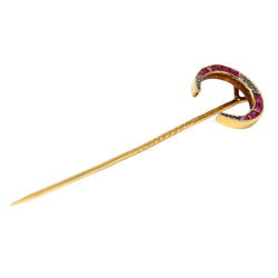 Broche en or jaune, rubis et diamants