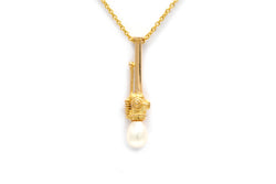 Pendentif en or jaune et perle