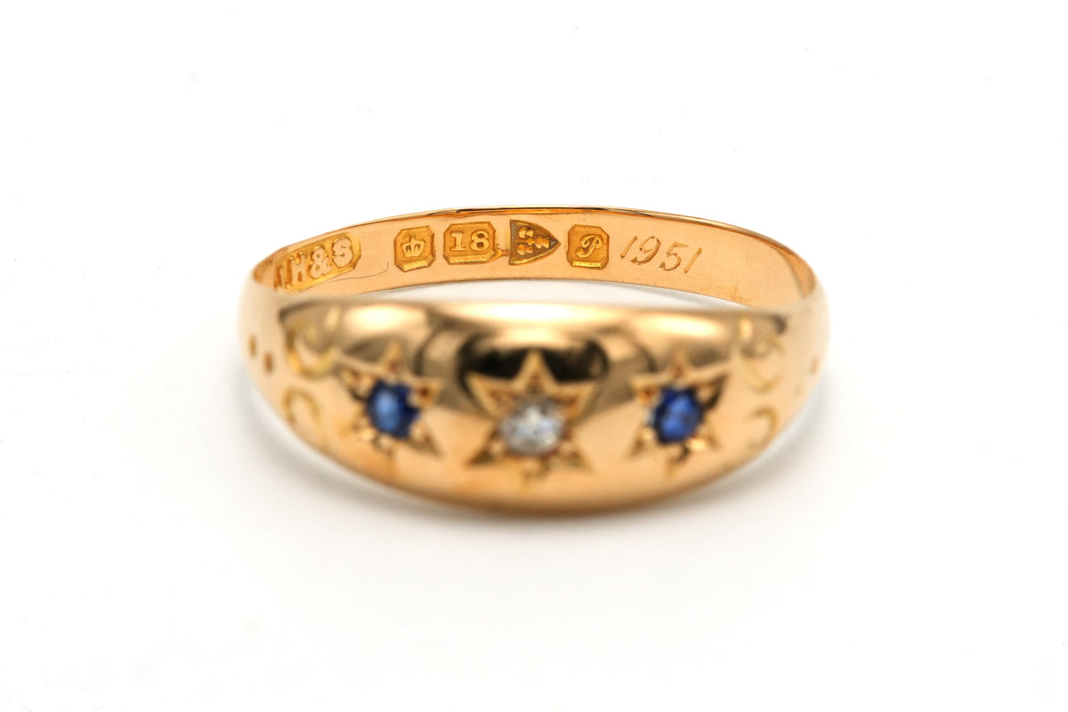 Bague en or jaune, saphirs et diamants