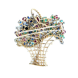 Broche en or jaune, rubis, saphirs, émeraudes et diamants