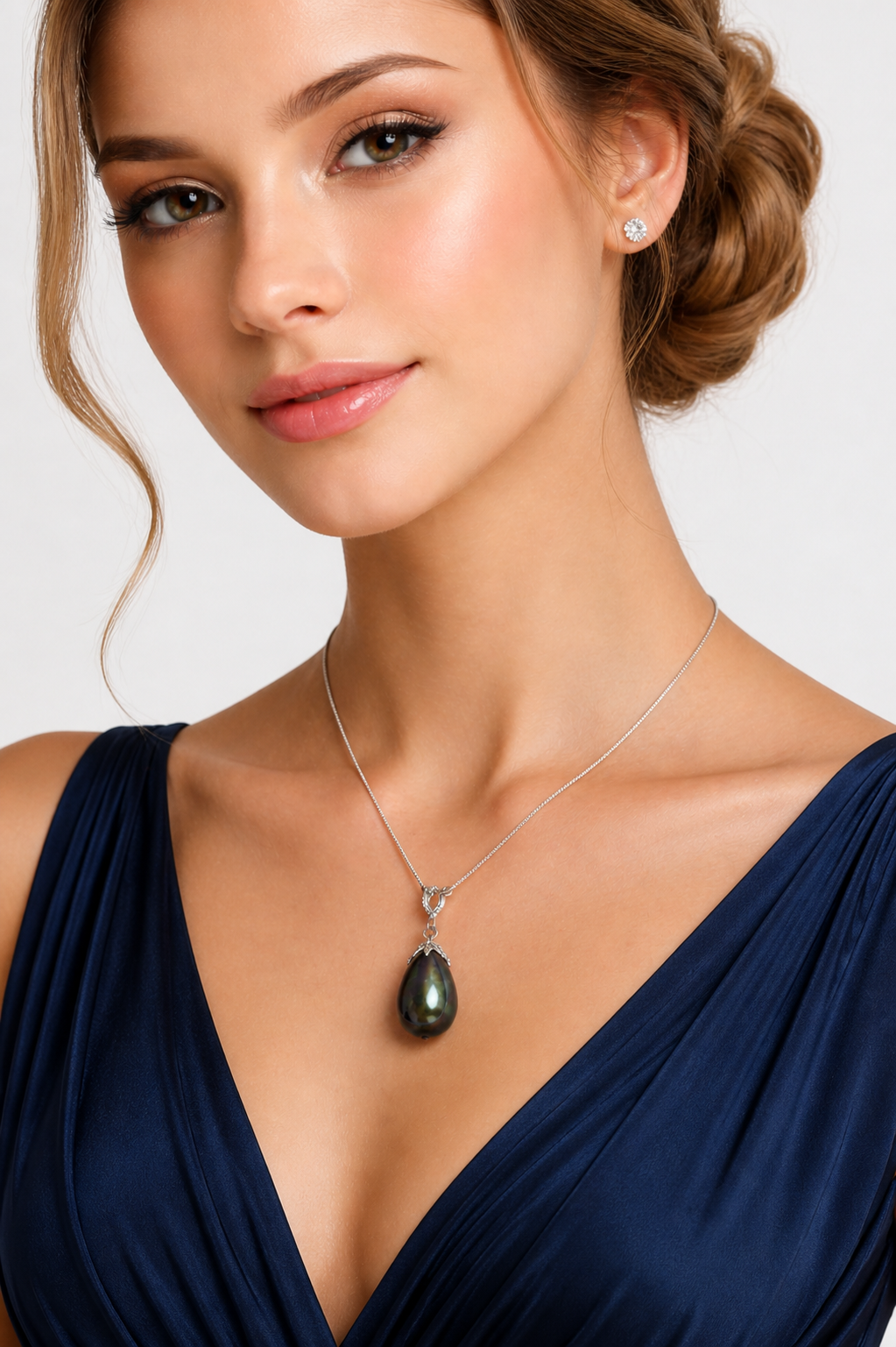 Pendentif en or blanc et perle