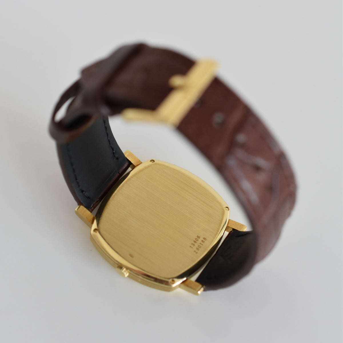 Montre PIAGET Coussin en or jaune et cuir
