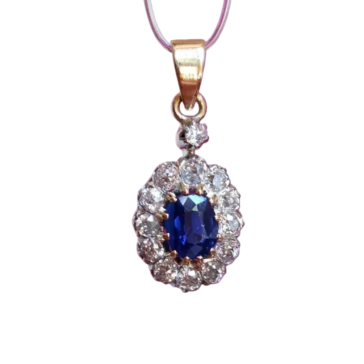 Pendentif en or jaune, saphir et diamants