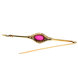 Broche Épingle en or blanc, or jaune, rubis et diamants