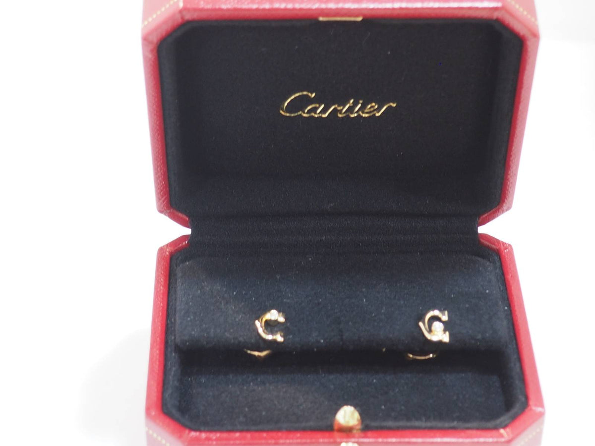 Boucles d'oreilles Puces CARTIER "C" en or jaune et diamants
