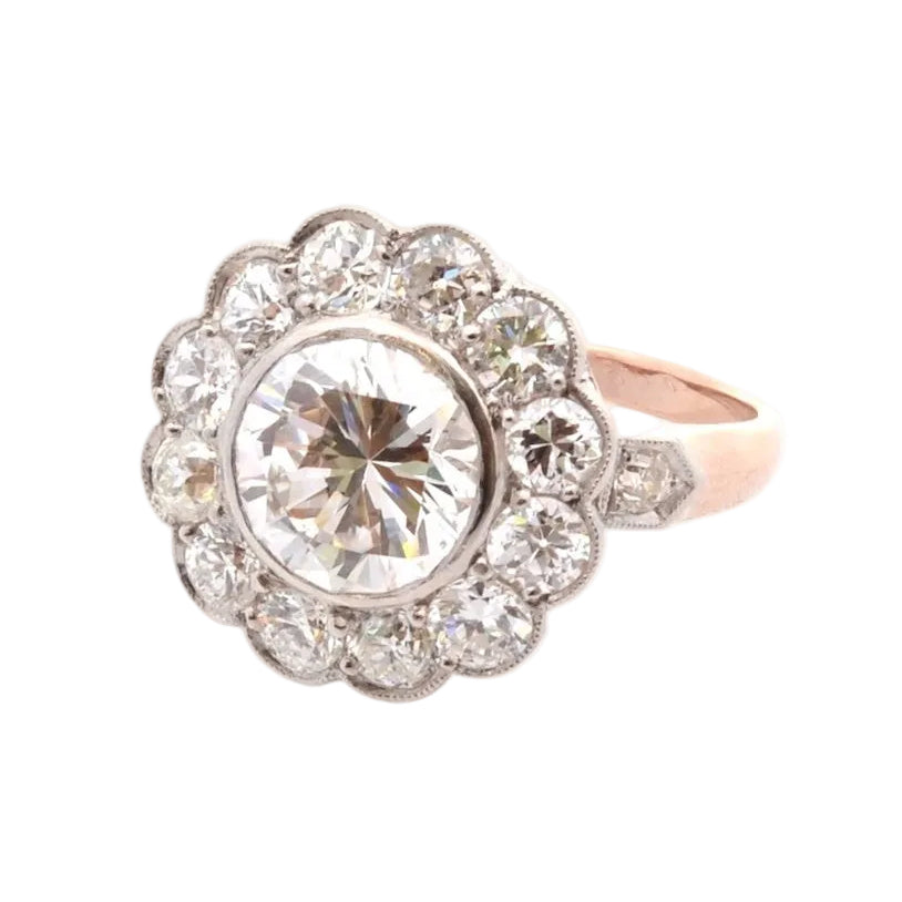 Bague Marguerite en or rose, platine et diamants