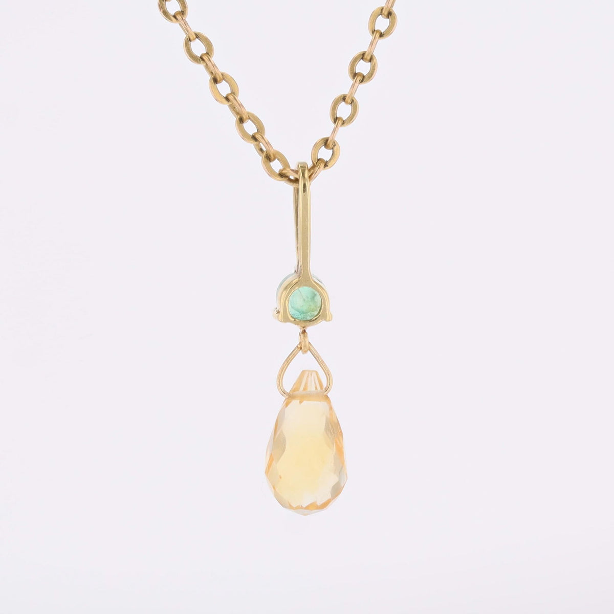 Pendentif en or jaune, émeraude et citrine