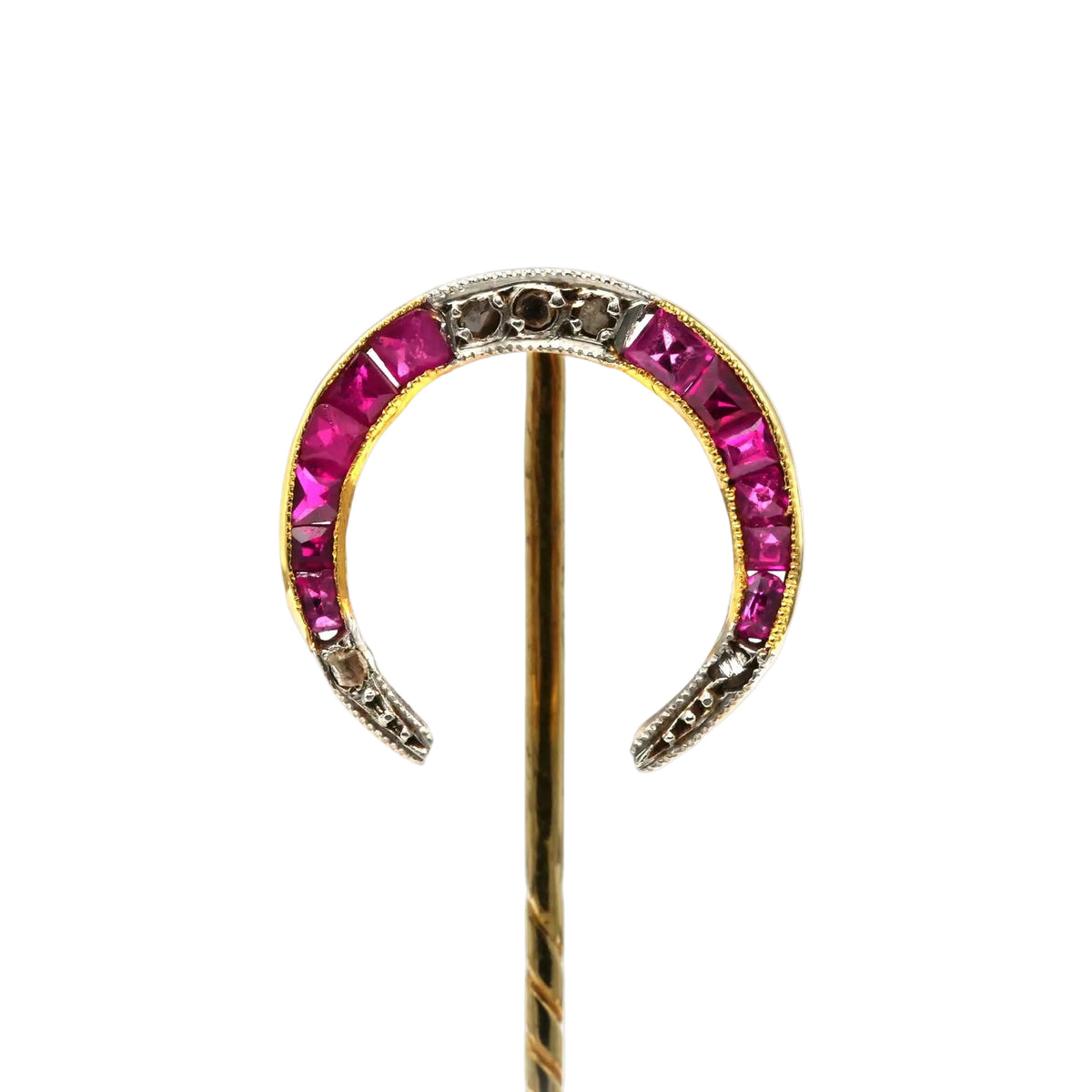 Broche en or jaune, rubis et diamants