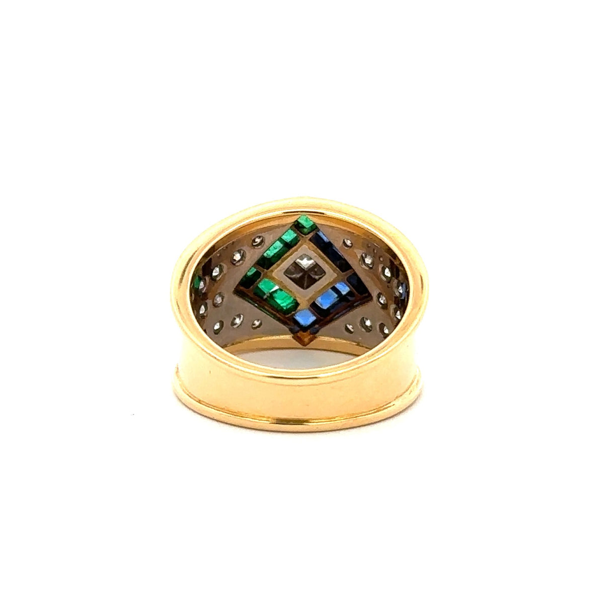 Bague en or blanc, or jaune, saphirs, émeraudes et diamants