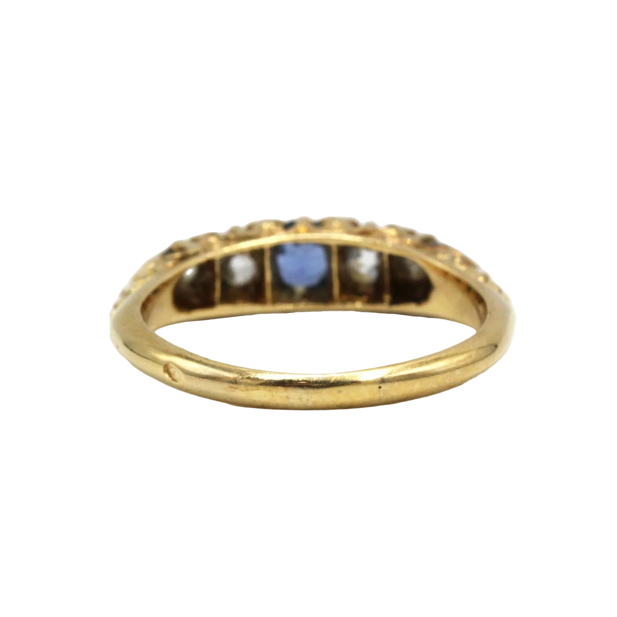 Bague Jarretière en or jaune, saphir, et diamants