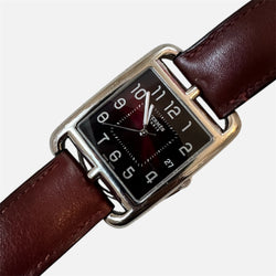Montre HERMÈS en acier, cuir et quartz