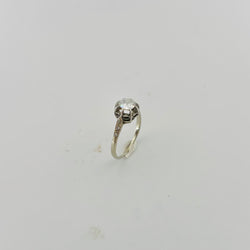 Bague Solitaire en or blanc, platine et diamants