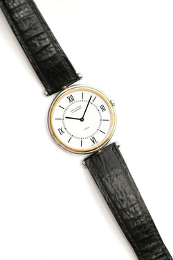 Montre VAN CLEEF & ARPELS PA 49 en or jaune, acier et cuir