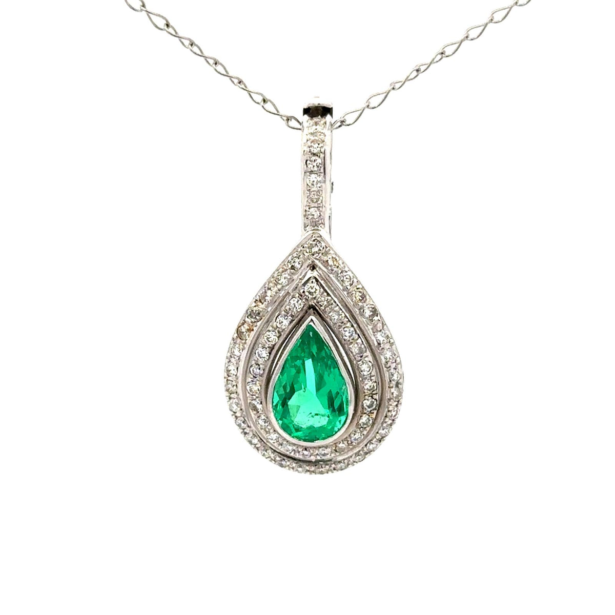 Pendentif en or blanc, émeraude et diamants